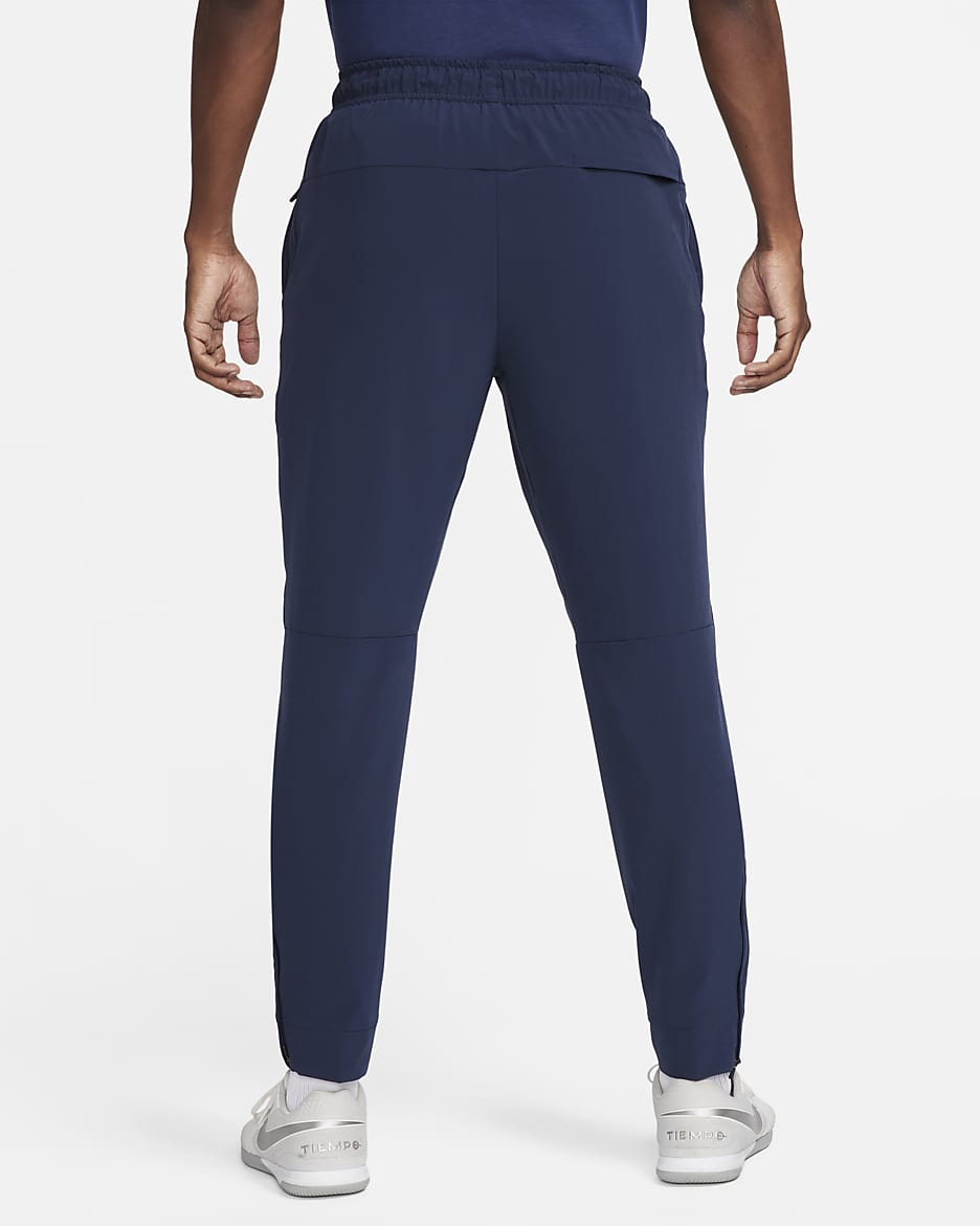 Nike Unlimited vielseitige Dri FIT Hose mit ReiBverschluss am Bundchen fur Herren. Nike DE